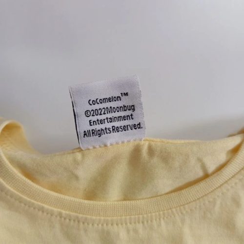 Cocomelon sárga alapon színes mintás lányka póló 98/104